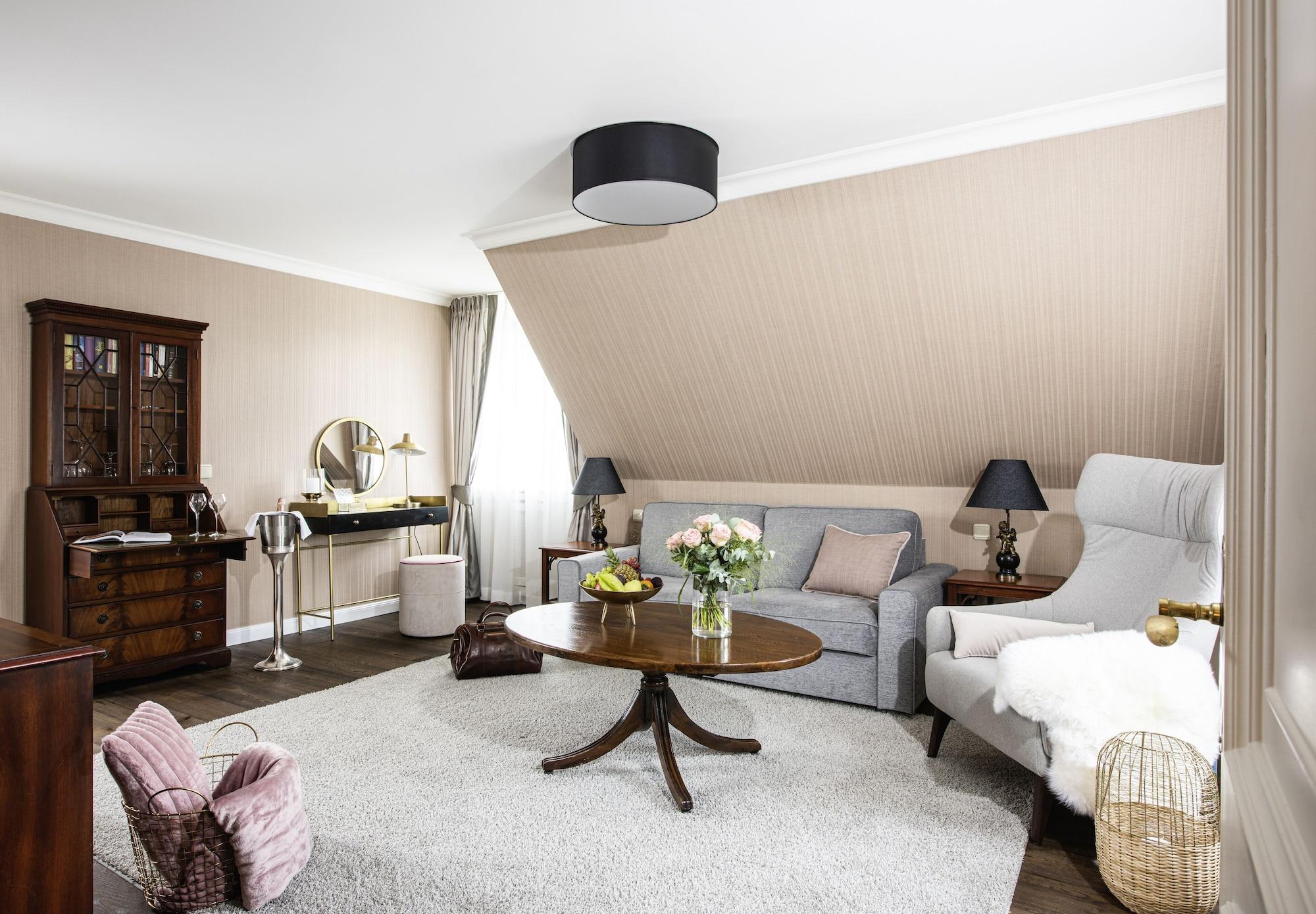 Althoff Hotel Fuerstenhof Celle Exterior foto A living room
